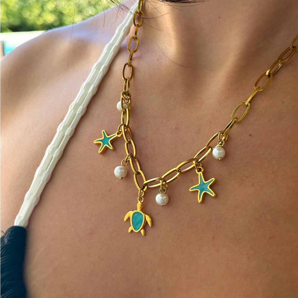 Κολιέ Από Ατσάλι Επιχρυσωμένο Με Αστερίες Και Χελώνα AA13724